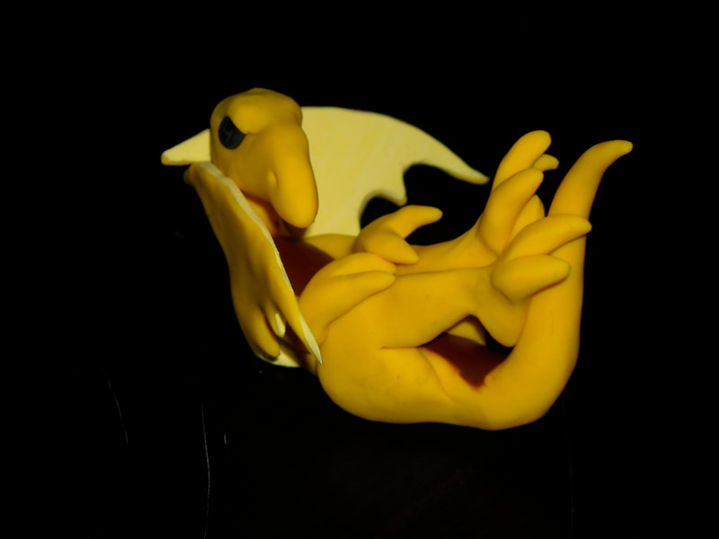 Yellow polymer dragon, inspired by a banana