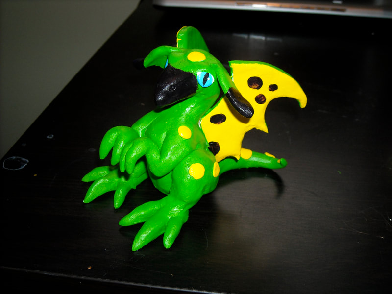 A clay version of the green with yellow spotted dragon called 'Spoonwinkle'