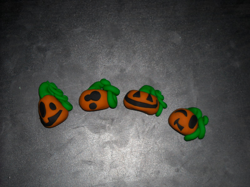 Jack'o'lantern magnets made of polymer clay
